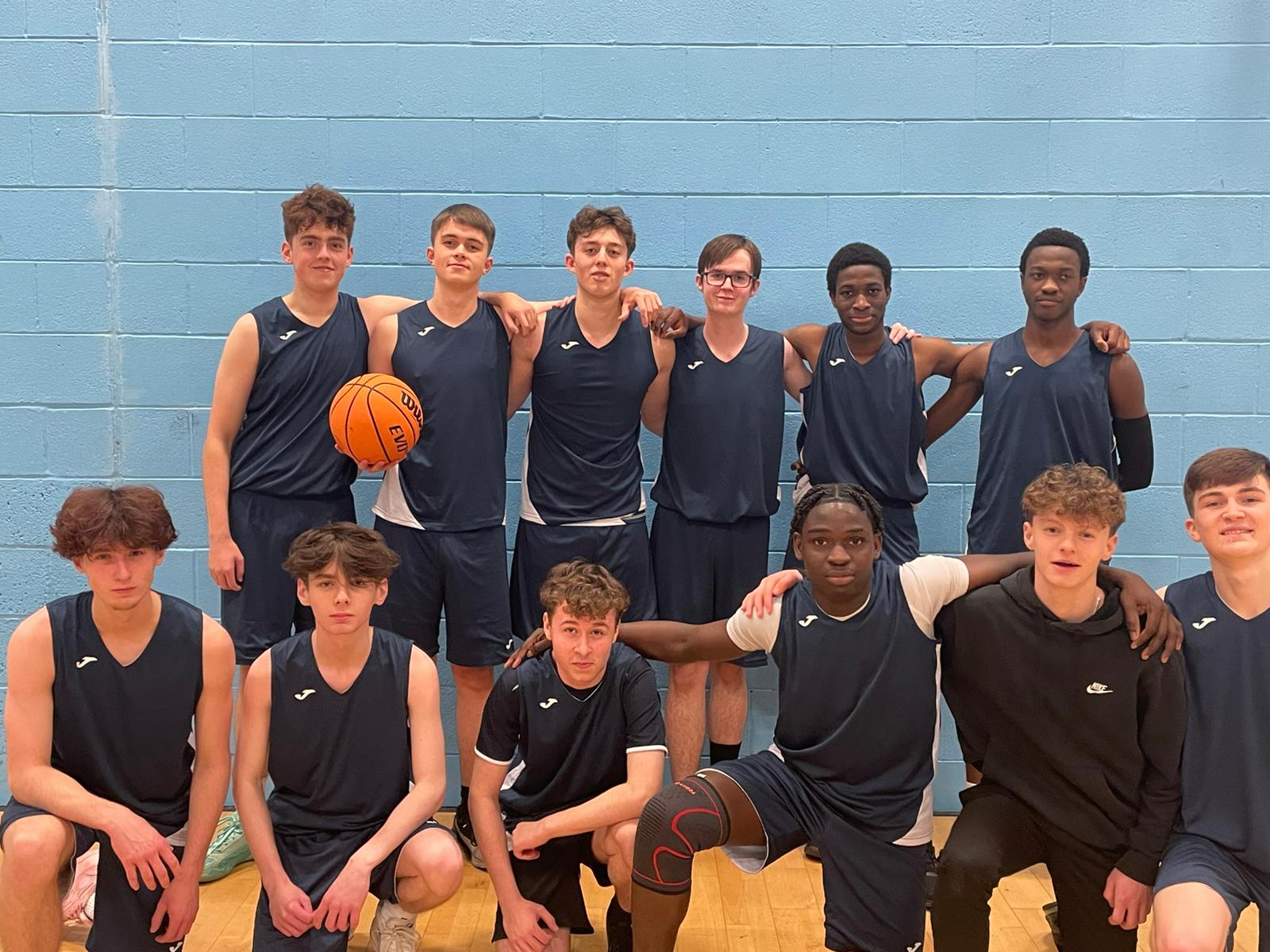 Group Image of the author with the school basketball team
